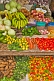 Image of Assorted fruit and vegetables for sale on market stall.
