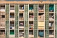 Image of Balconied apartment building with laundry drying in the sun.