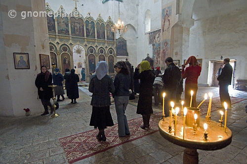 Eastern Orthodox worshippers gather for mass at the Ananuri Monastery.