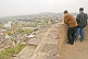 Two men gaze at the view over central Tbilisi from the ramparts of the Narikala Fortress.