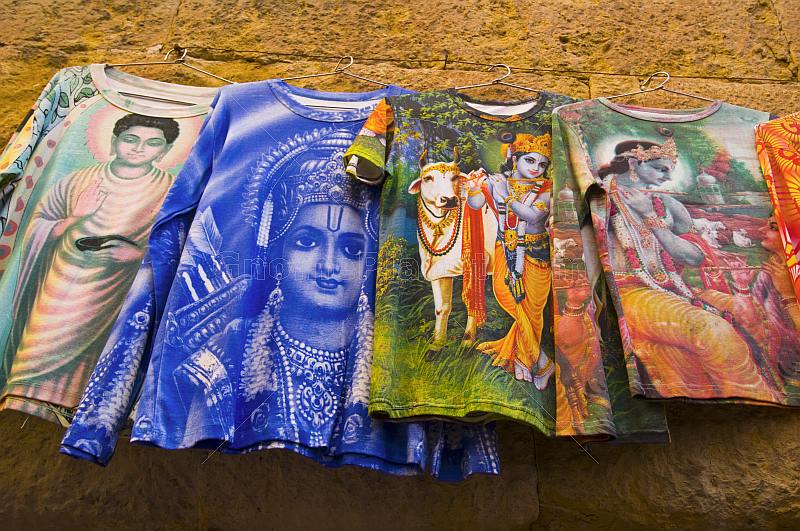 A selection of colorful teeshirts on sale to the backpacker visitors to this desert city.