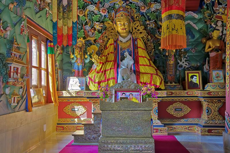 Buddhist statue in colorful robes at the Bhutanese Temple.