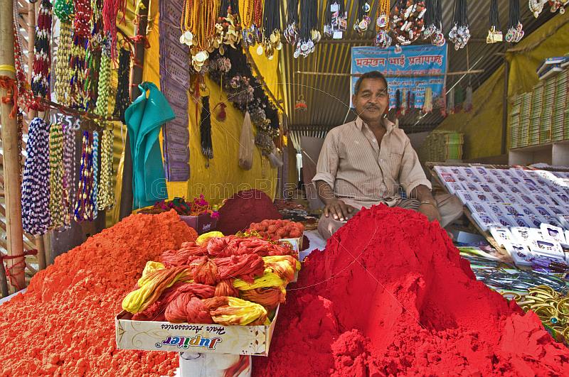 Festival stall sells colored powder known as Sindoor or Goolal or Kum-kum powder.