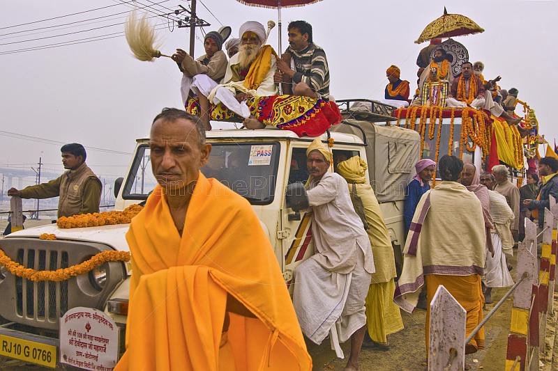Jeeps and trucks laden with Hindu Sadhus wait for Kumbh Mela Procession to start.
