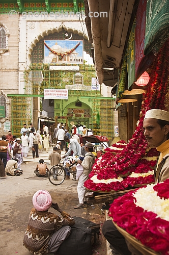 Rose-blossom sellers wait outside the Dargah of Khwaja Muinuddin Chisti.