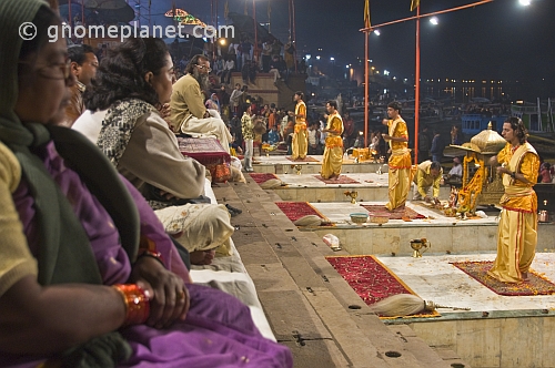 Evening 'Aarti' or fire puja performed by Hindu priests on the banks of the Ganga River.