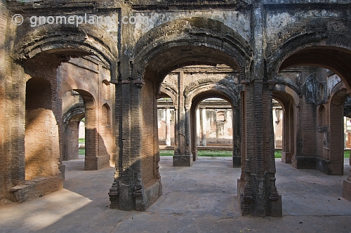 Brick arches surround the gutted ruins that are the remains of the Residency.