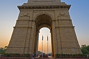 Sunset through 42m high Lutyens-designed India Gate war memorial.
