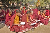 Buddhist monks wait for services to begin at the Mahabodhi Temple.