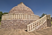 The  Northern Stupa is similar in design to the Main Stupa, though smaller, and with a single gateway.