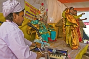 Two Girls Perform Hindu Religious Dance Accompanied By Organ