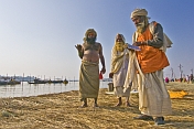 Three Hindu Holy Men At The Ganges Yamuna Sangam