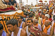Mass Crowds Of Holy Men And Jeeps Block The Procession Road