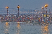 Mass Crowds Of Pilgrims Bathe At The Ganges Yamuna Sangam Before Dawn