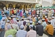 Image of Worshippers in the marble courtyard of the Dargah of Hazarat Nizamuddin.