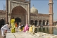 Image of Muslim women perform ablutions before going to pray at Shah Jahan's Jama Masjid mosque.