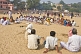 Groups of pilgrims wait to have their priest perform Hindu ceremonies on the dried-up bed of the Phalgu River, near the Vishnupad Temple.