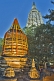 Image of Twilight view of small stupas and the Bo tree of Enlightenment in front of the main Mahabodhi Temple.