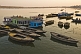 Boats for pilgims on the Ganges River at sunset.