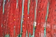 Image of Red prayer flags on green flagpoles at the Pemayangtse Monastery.
