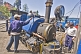 Engineers struggle to get a steam engine on the Darjeeling Himalayan Railway ready for service.