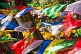 Image of Colorful Buddhist prayer flags dance in the wind at the Mahakala Temple on Observatory Hill.