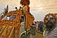 Sadu and truck decorated with marigold flowers for Basant Panchami Snana procession.