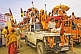 Highly decorated jeeps with Hindu Sadhus in Basant Panchami Snana procession.