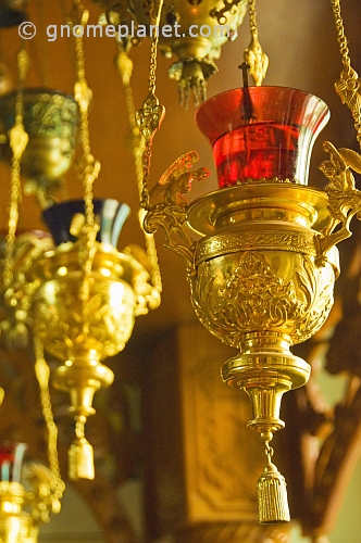 Gold oil lamps with colored glass shades in Saint Nicholas Cathedral, on Qabanbay Batyr.