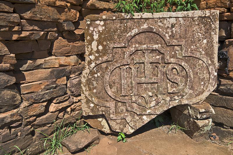 Carved stone christian plaque at the ruins of the San Ignacio Mission.
