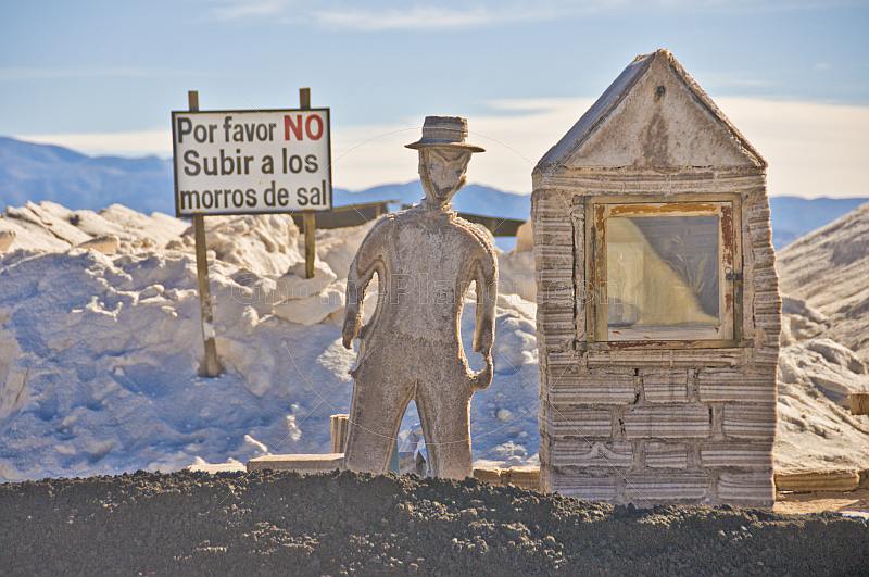 Statue of man made from rock salt at the Sal de Guayatayoc salt pans.