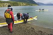 Canoers prepare their kayaks for the Beagle Channel.