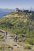Visitors pose on the Cerro Otto overlooking Lago Nahuel Huapi.