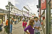 Pedestrian precinct busy with shoppers on the Calle Florida.