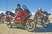 Group of motorcyclists on Honda Goldwing bikes at the Sal de Guayatayoc saltpans.