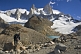 Image of Trekker climbs to the Fitzroy Mountains in the Parque Nacional Los Glaciares.
