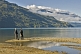 Visitors view the mountains around the Lago Puelo.
