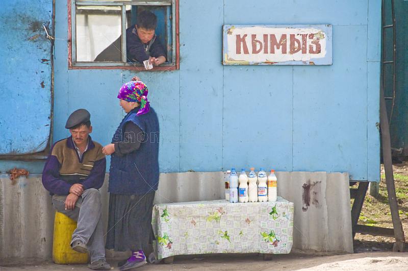 Kumiss Sellers wait by the roadside.