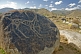 A range of Bronze-age and Saka-Usun period petroglyphs, including this Long Horned Ibex, in the Boulder Valley near Cholpon-Ata.