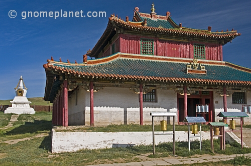 Shanhyn Monastery frontage with prayer wheels and stupa.