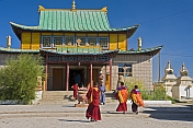 Monks hurry to a service in the Gandan Muntsaglan Khiid monastery.