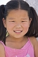 Image of Young Mongolian girl in pink top.