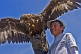 Image of Eagle and Mongolian bird-handler.