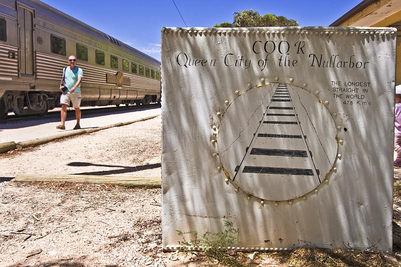 Painted water tank advertises Queen City of the Nullarbor at Cook railway station.