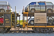Vans and cars on the car transporter carriage of the GSR Ghan train.