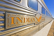 Indian Pacific signboard and logo on carriages at Broken Hill railroad station.