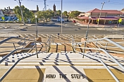 Exit stairs and railings from Broken Hill station to Crystal Street and The Mall.