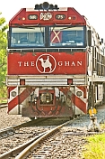 Red Ghan railway locomotive crosses the switches at Alice Springs station.