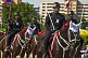 Mounted officers of the Nacional Police Service take part in the parade along Avenida Balboa.