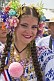 A woman wearing the elaborate combs and other Panamanian head ornamentation known as 'tembleques' for National Flag Day.